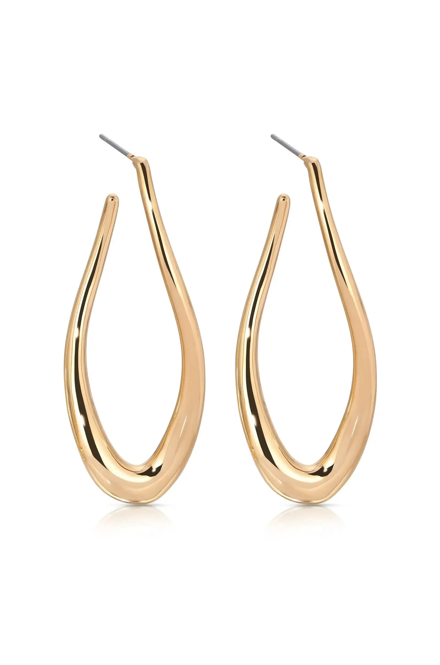 Two elongated, teardrop-shaped gold earrings are displayed upright. Their smooth surface reflects light, creating a shiny appearance. The setting is neutral, emphasizing the elegance of the jewelry.