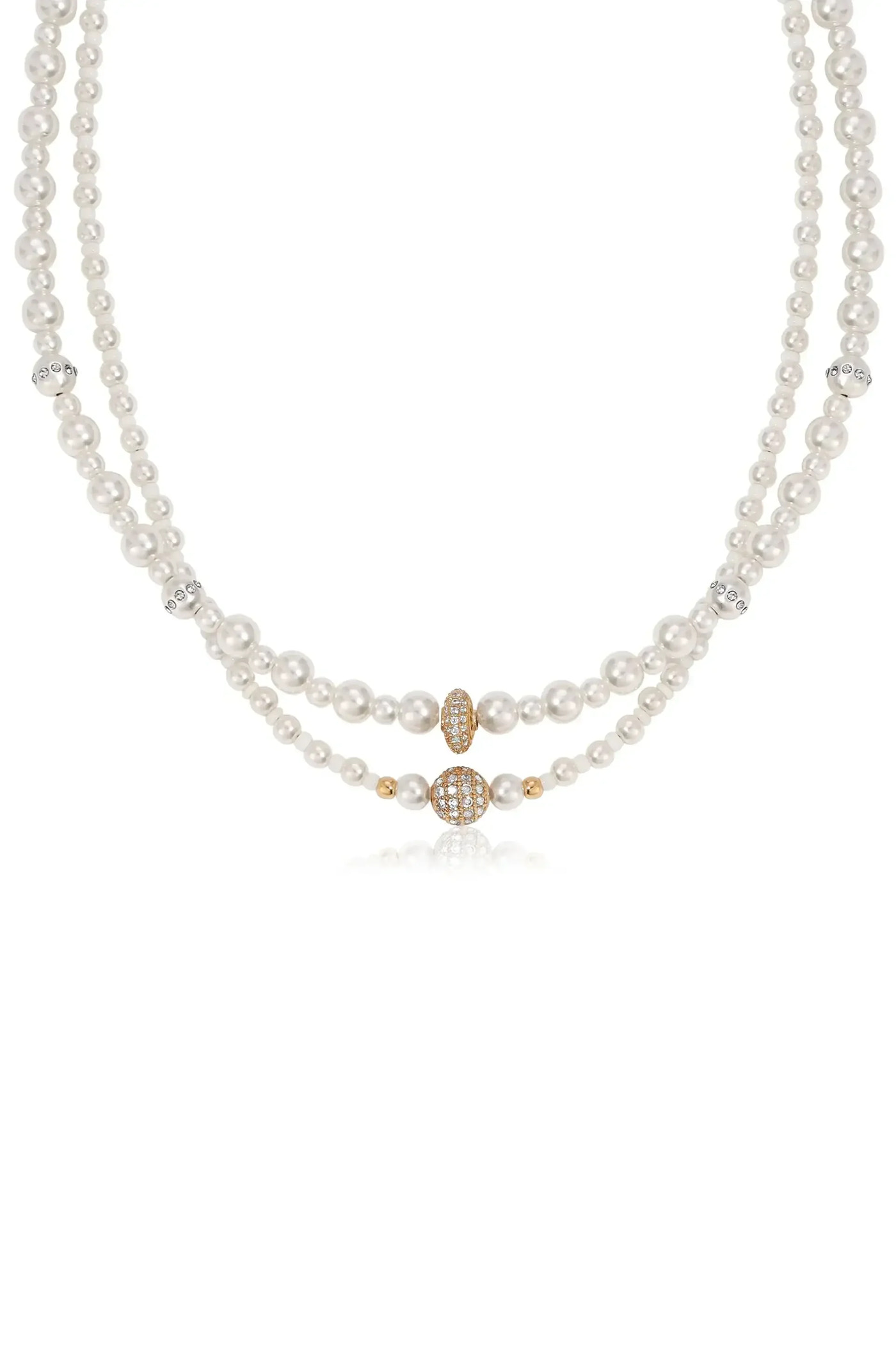 A pearl necklace features two strands of lustrous white pearls, interspersed with gold and diamond-encrusted accents, set against a clean, neutral background, highlighting its elegance and design.