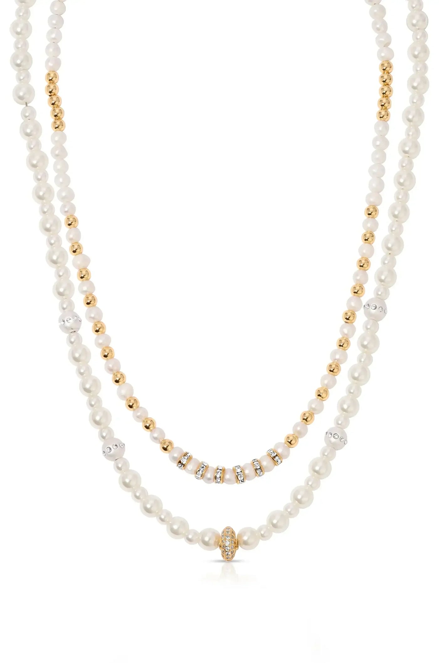 A layered necklace features alternating strands of white pearls and gold beads, with some adorned with sparkling accents, set against a plain, light background for emphasis.