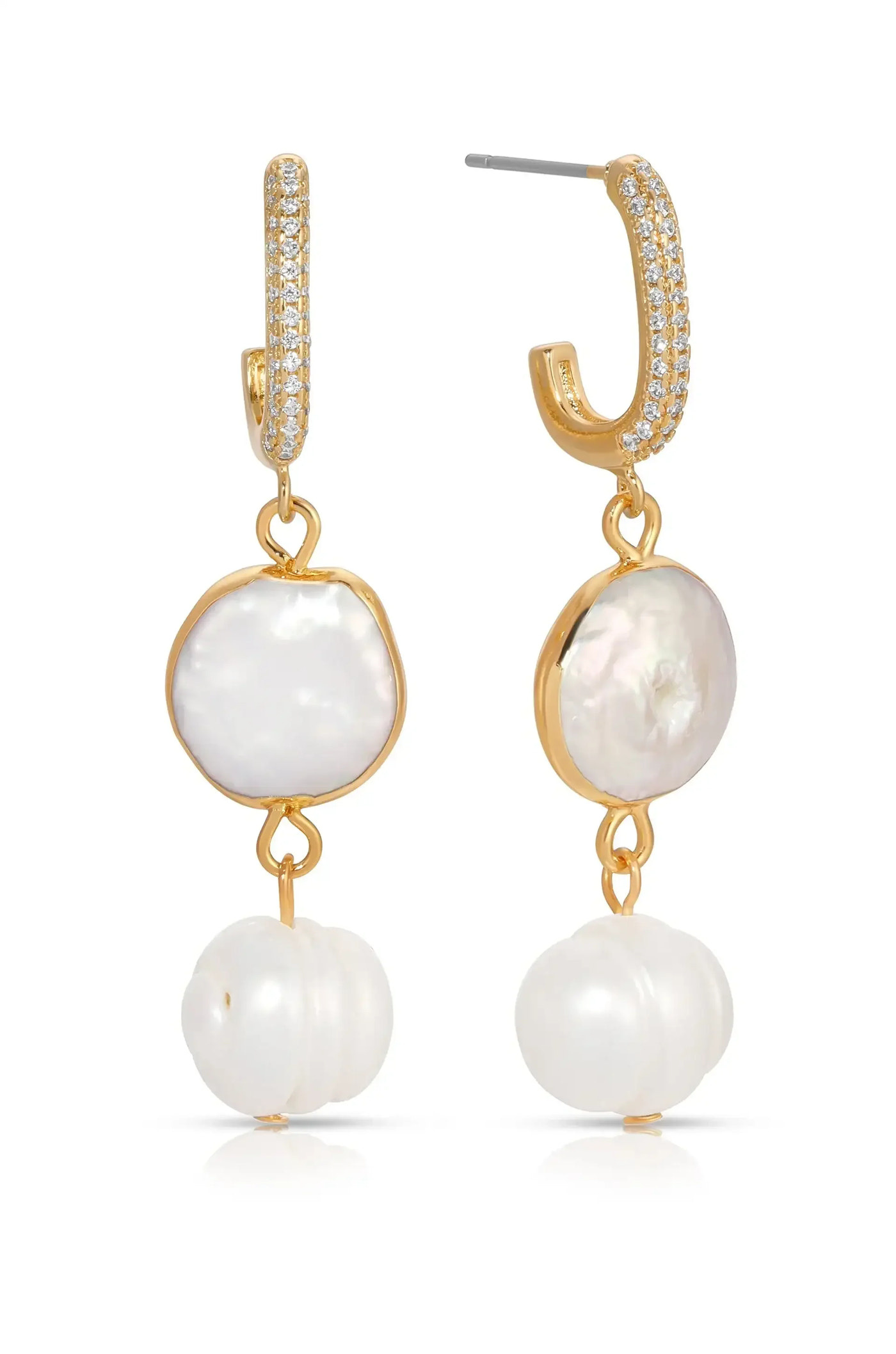 Elegant drop earrings feature a gold hoop with sparkling accents, showcasing two pearl-like elements: a flat disc and a spherical bead, set against a reflective surface.