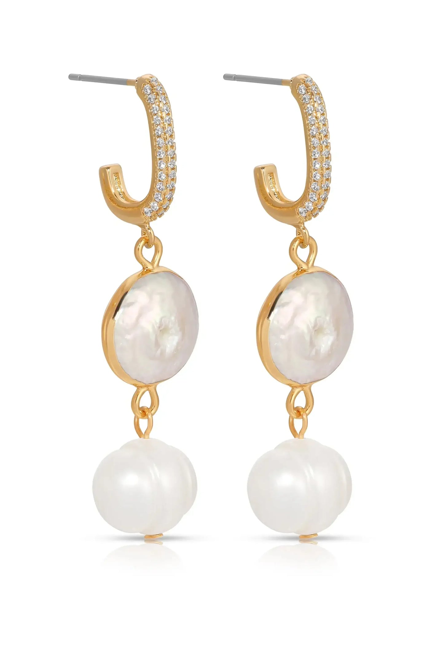 Gold hoop earrings with sparkling accents feature a large, round, iridescent pearl and a smaller, white, scalloped pearl underneath. They are displayed against a neutral background, emphasizing their elegance.