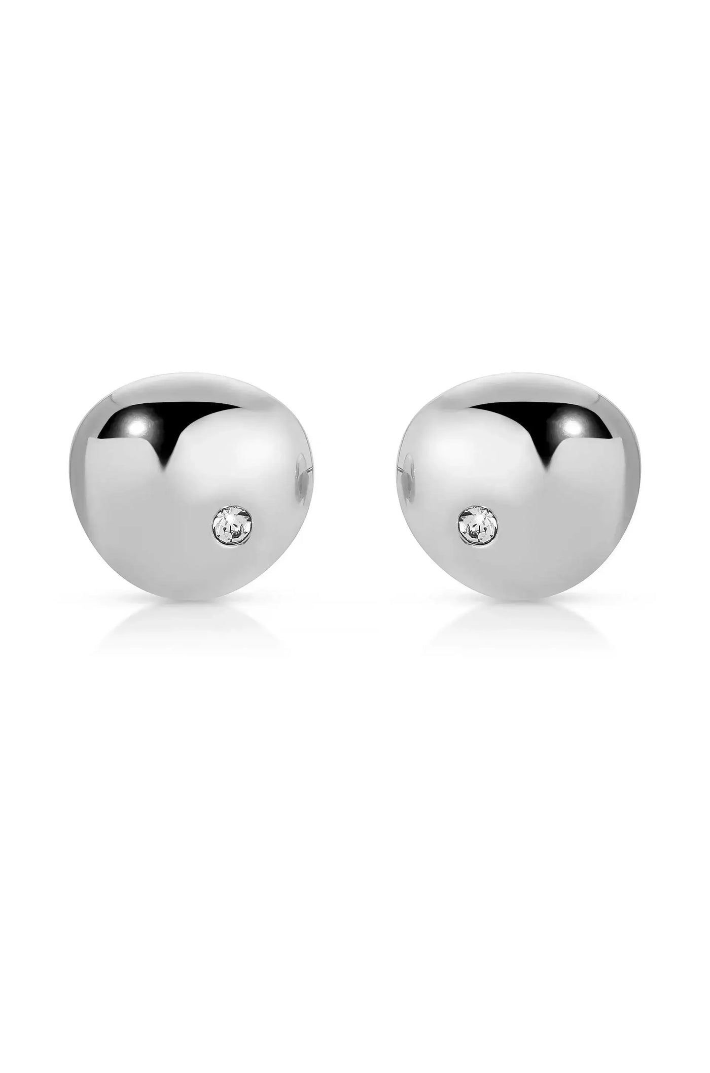 Two spherical silver earrings, each featuring a small diamond-like embellishment, are displayed against a plain white background, highlighting their sleek, polished design and reflective surfaces.