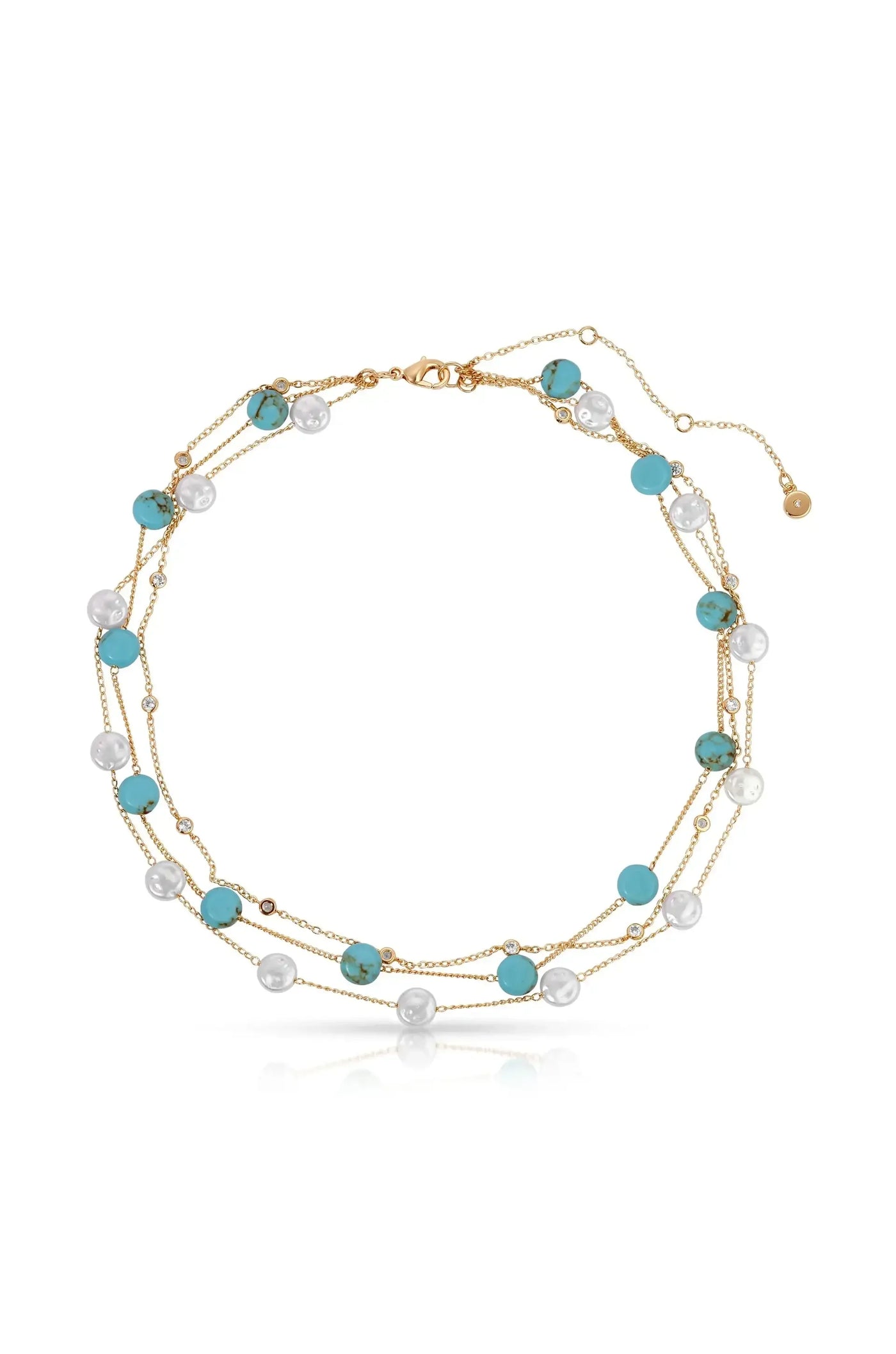 A delicate gold necklace features multiple strands adorned with alternating turquoise and pearl beads, creating a layered look. Its elegant design is showcased against a plain, white background.