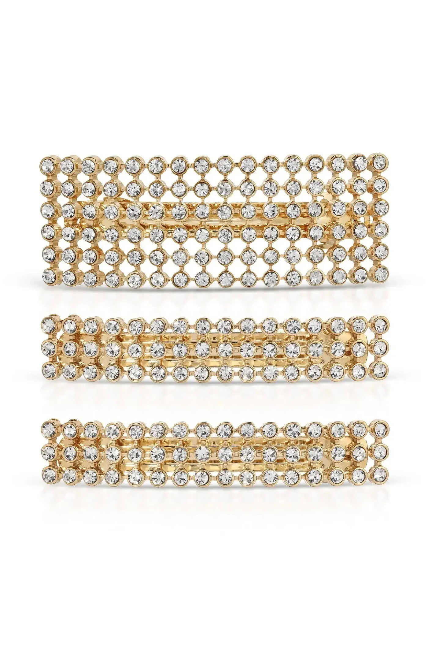 Three rectangular hair clips made of gold-colored metal, adorned with numerous small, sparkling rhinestones. They are arranged vertically against a plain white background, emphasizing their decorative design.