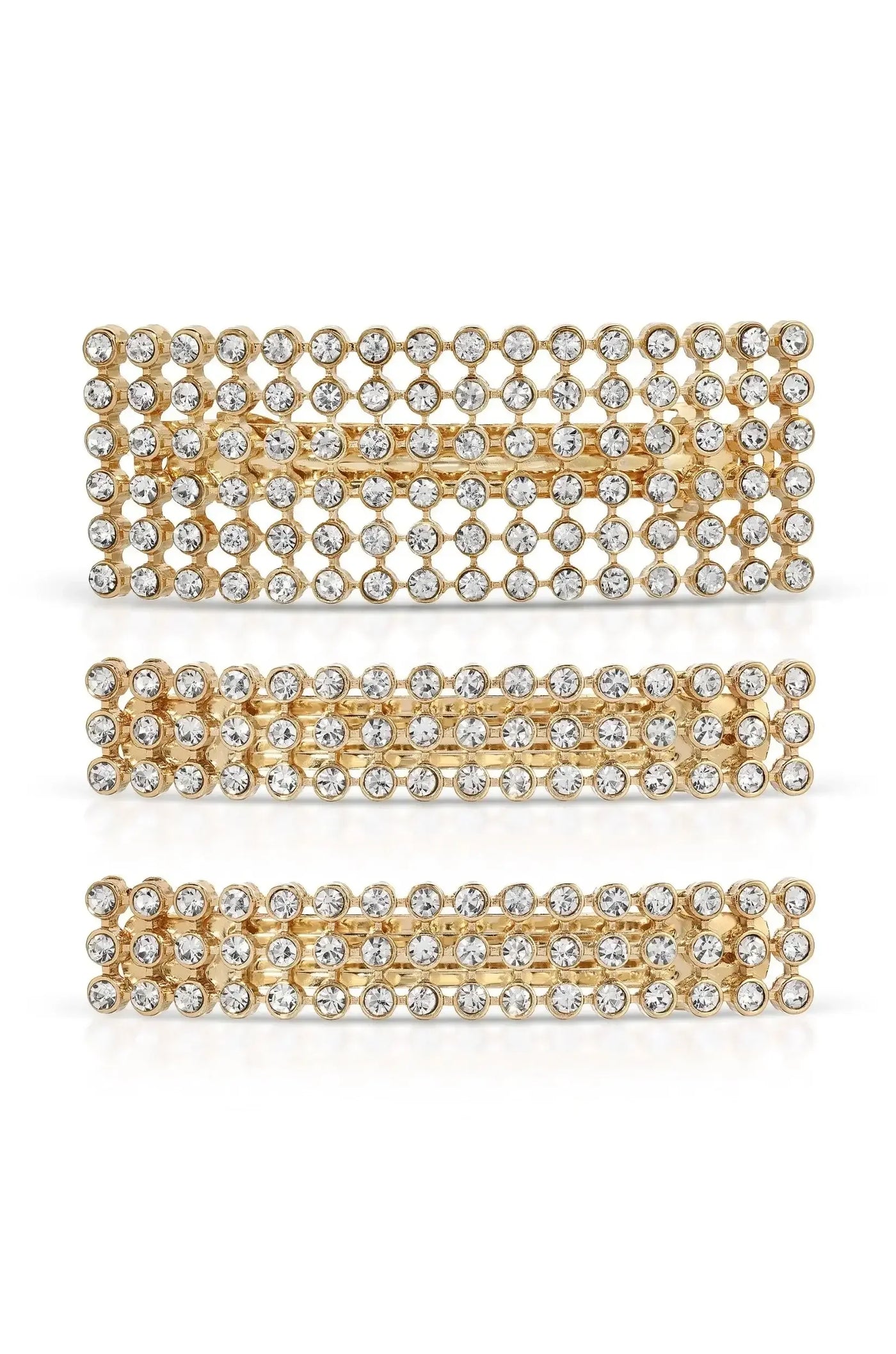 Three rectangular hair clips made of gold-colored metal, adorned with numerous small, sparkling rhinestones. They are arranged vertically against a plain white background, emphasizing their decorative design.