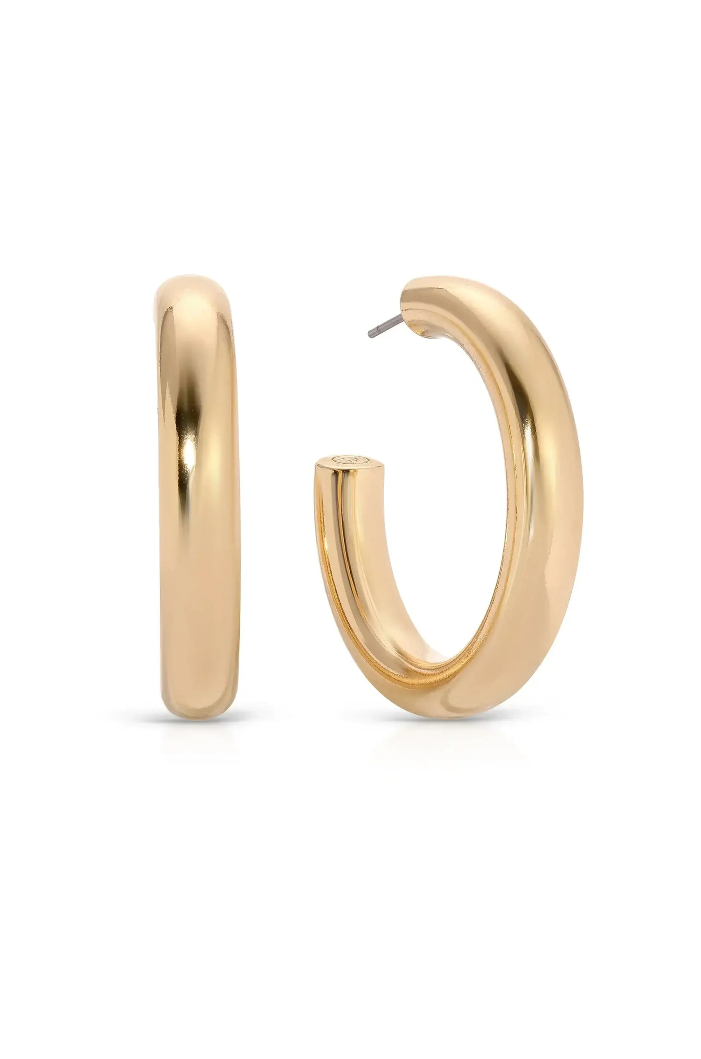A pair of shiny gold hoop earrings stands prominently, highlighting their smooth, rounded design. The background is plain and neutral, enhancing the earrings' elegant appearance.