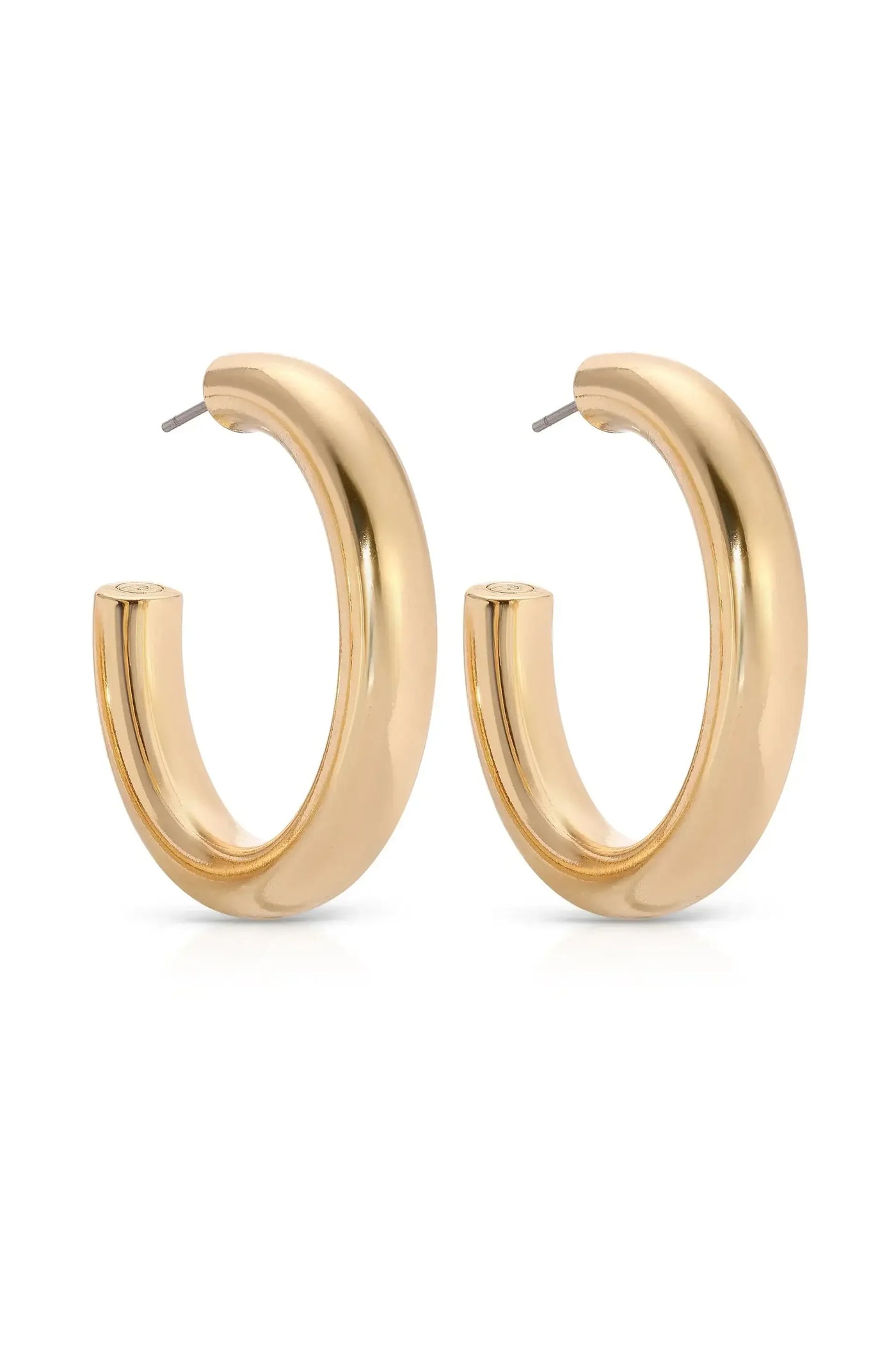 A pair of polished gold hoop earrings is displayed prominently, showcasing their smooth, rounded design. The earrings are positioned against a clean, white background, emphasizing their elegant appearance.