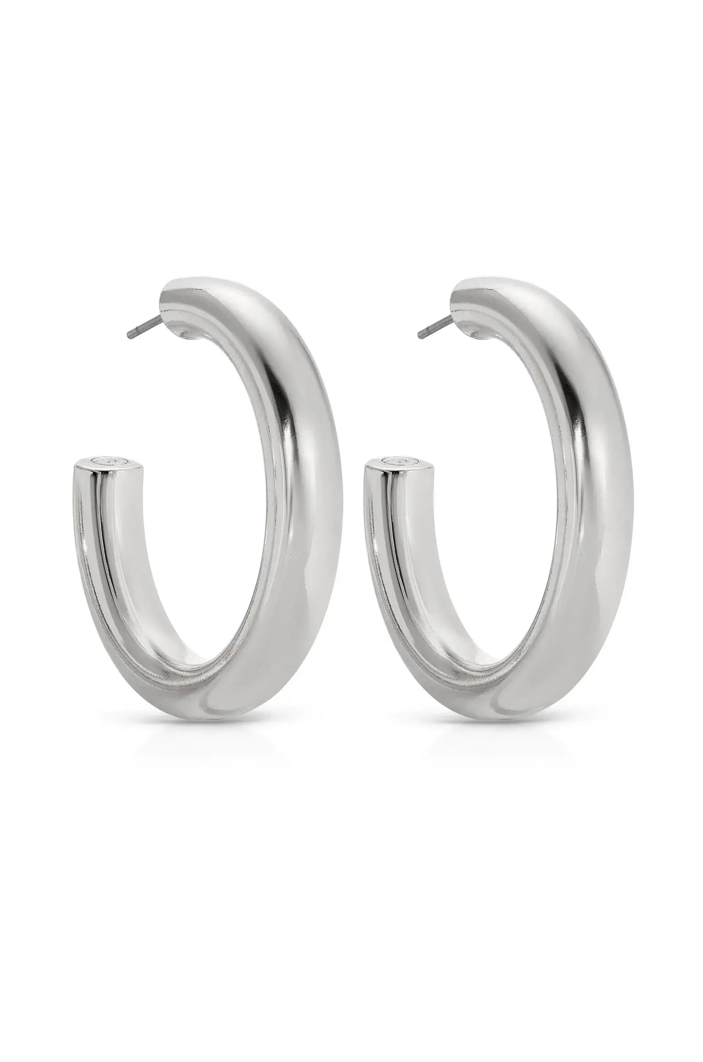 A pair of shiny silver hoop earrings is displayed, showcasing a smooth, rounded design. The earrings are aligned side by side against a plain, light background, emphasizing their elegance.