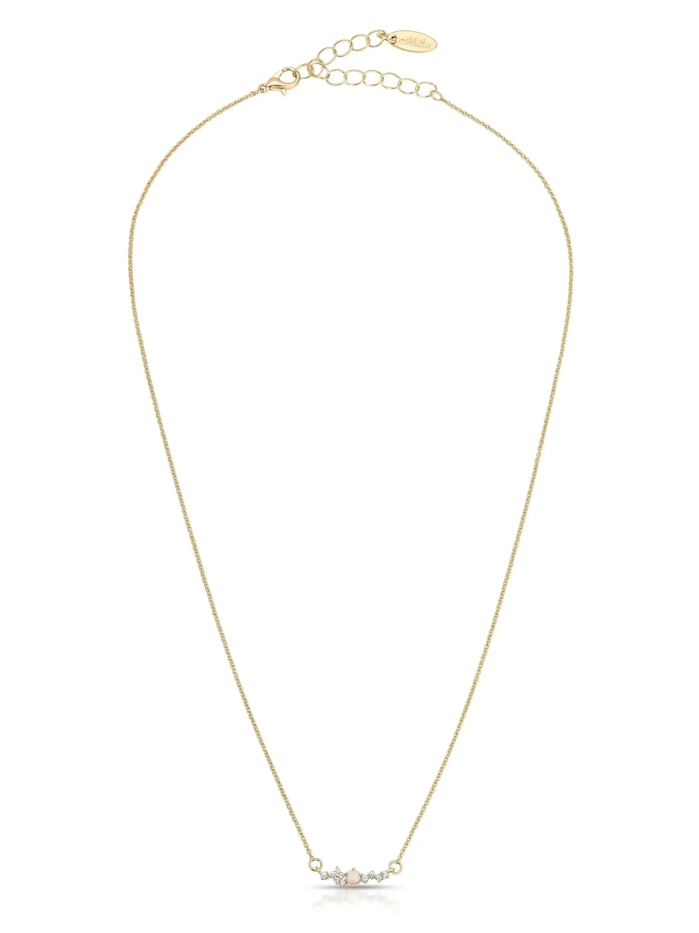 A delicate gold necklace with a fine chain features a central arrangement of small gemstones. It is displayed against a plain white background, emphasizing its elegance and design.