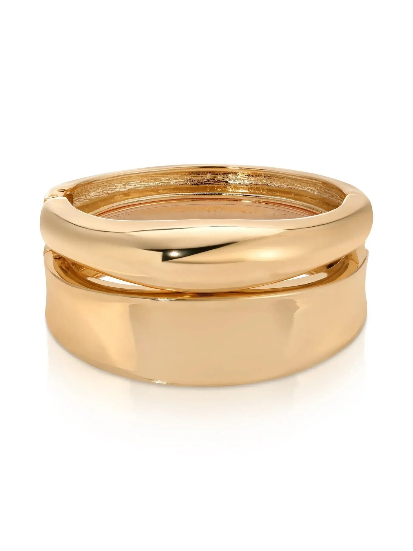 A gold-colored ring features a smooth, shiny surface with two interlocking bands, one slightly thicker than the other. It is isolated against a white background, emphasizing its polished finish.