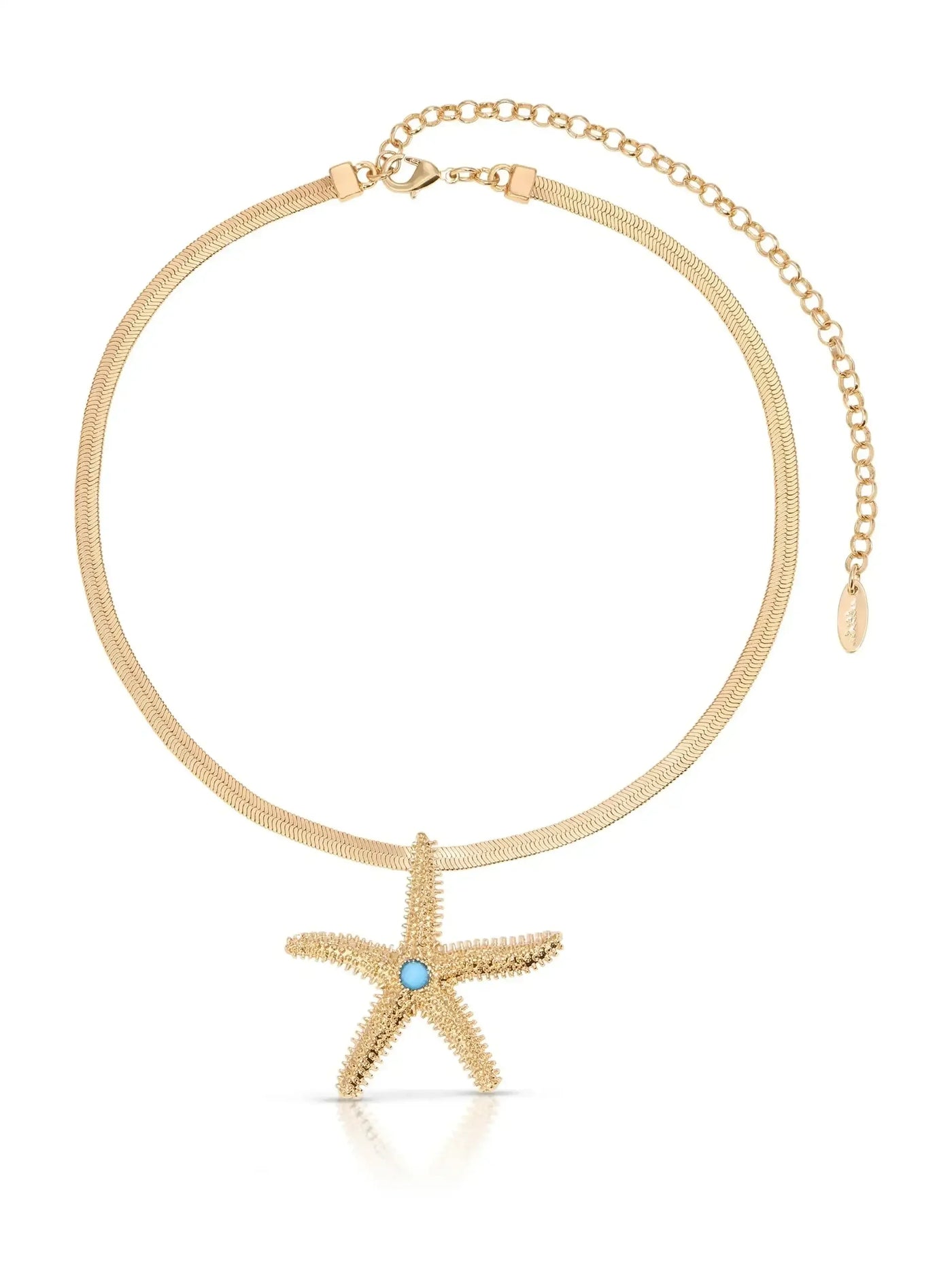 A gold necklace features a starfish pendant with a blue stone at its center. The chain is a smooth, flexible design, and the setting suggests a beach-themed aesthetic.