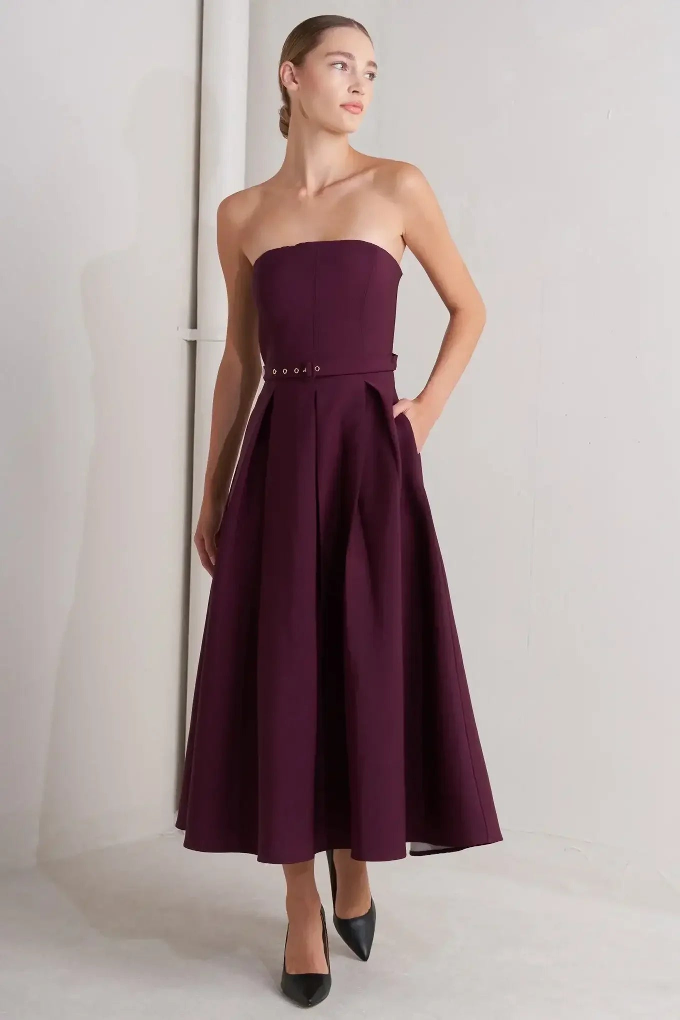 Strapless burgundy dress with a belt