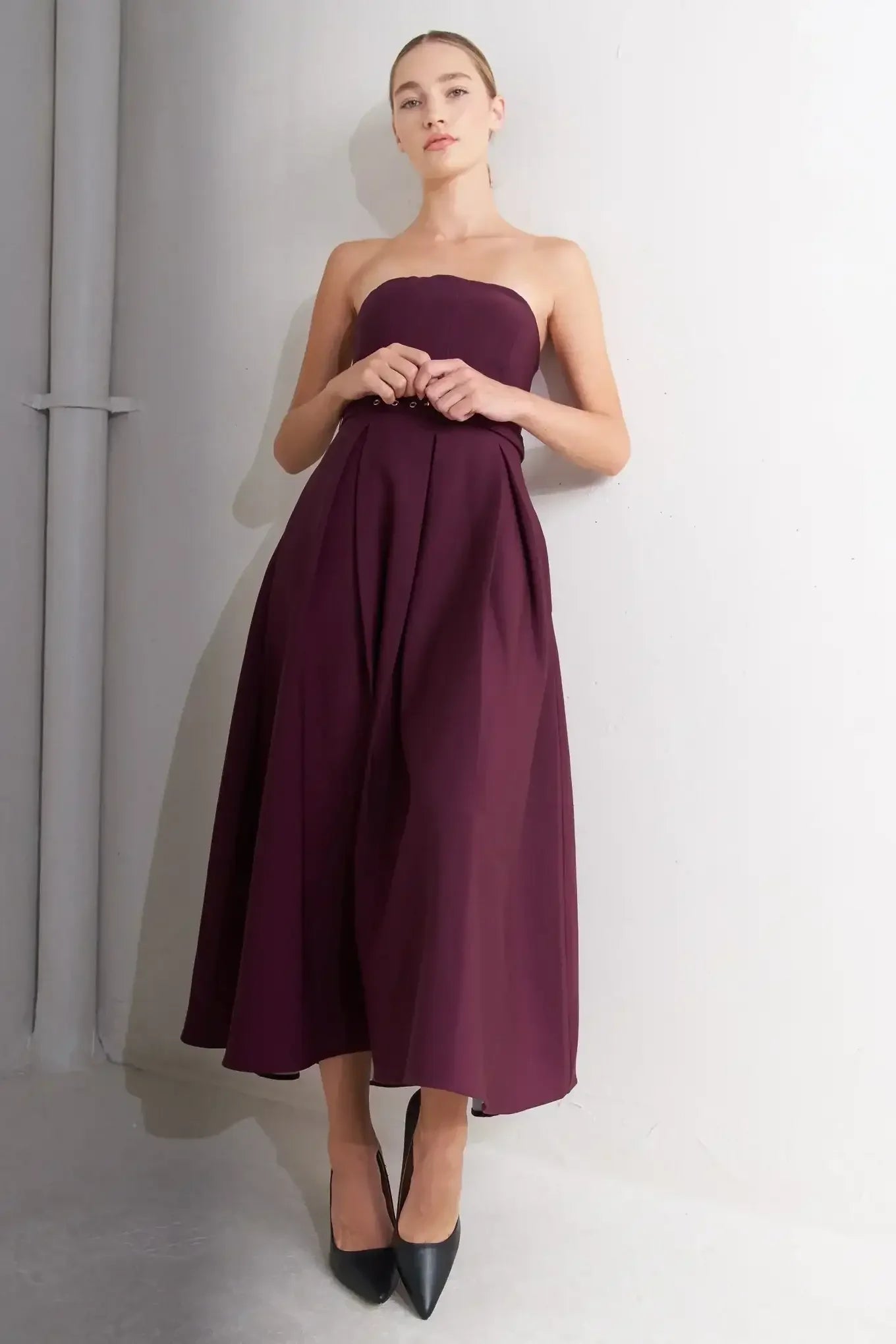 Strapless burgundy dress with a belt