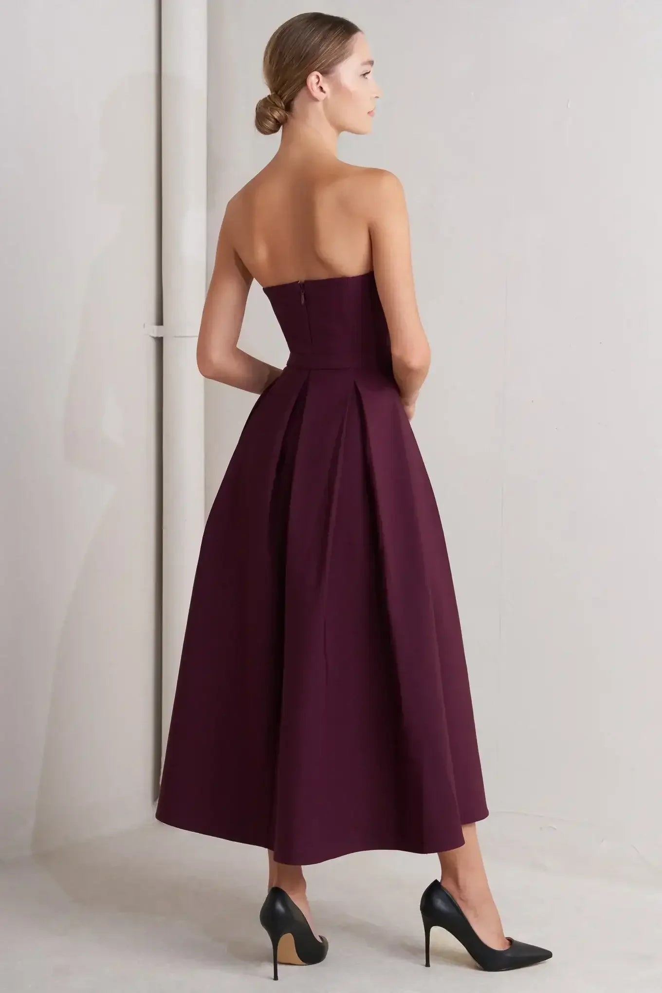 Strapless burgundy dress with a belt