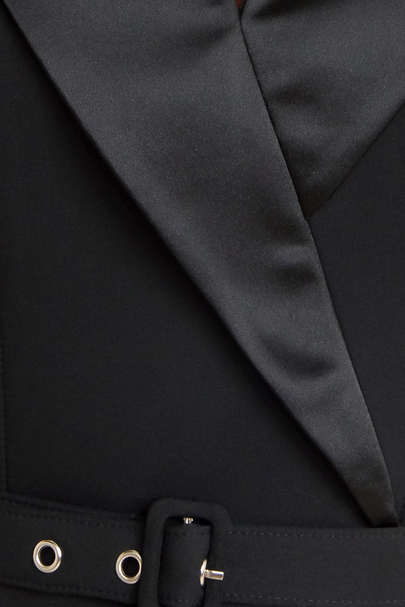 Black dress with a fitted bodice and flared skirt