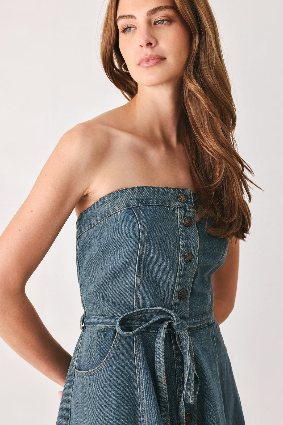 Strapless Button Front High Low Denim Midi Dress in Medium Indigo, close-up of strapless button-front bodice | Lady Black Tie