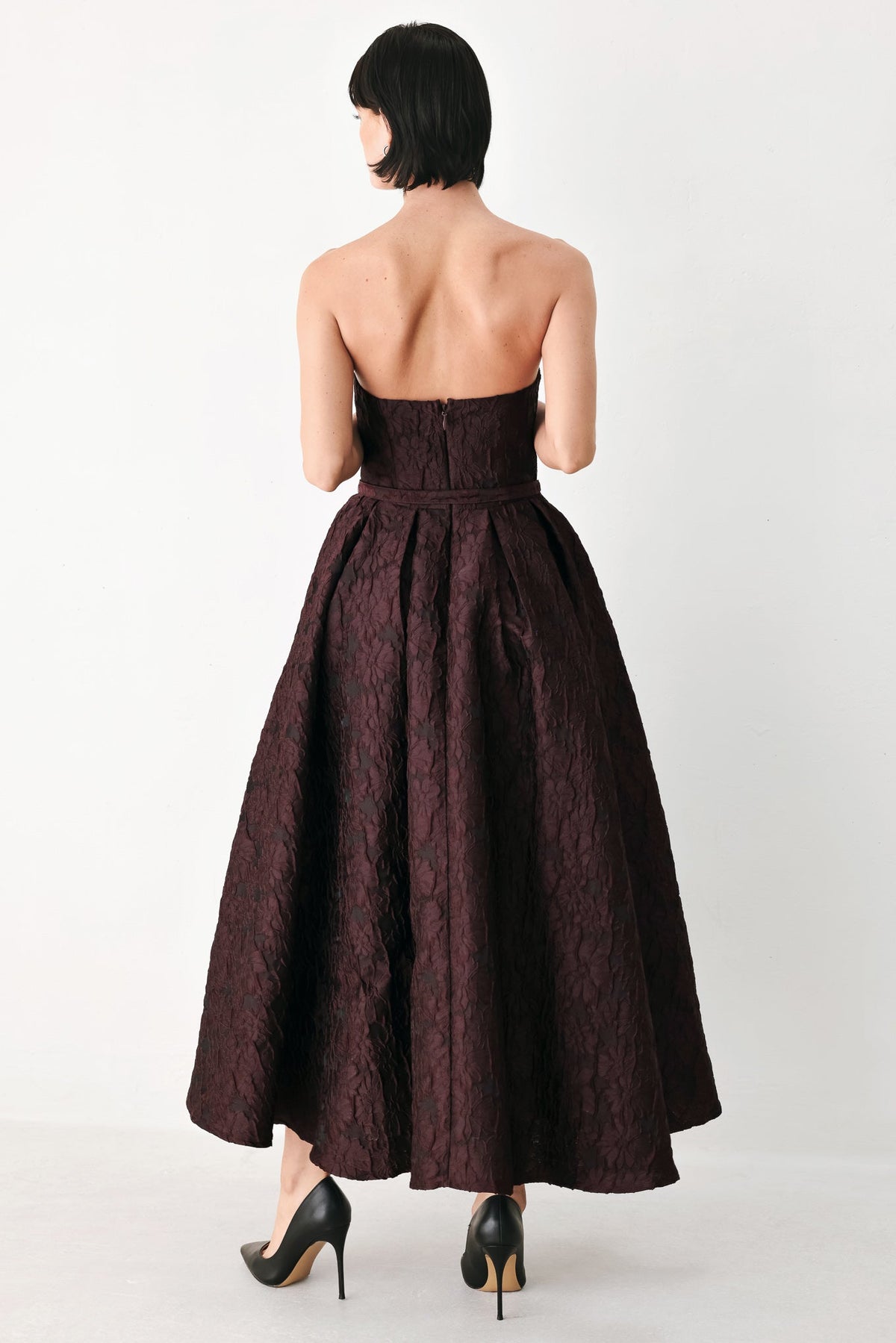 Burgundy Strapless Jacquard Midi Dress with Pockets in Burgundy, back view | Lady Black Tie