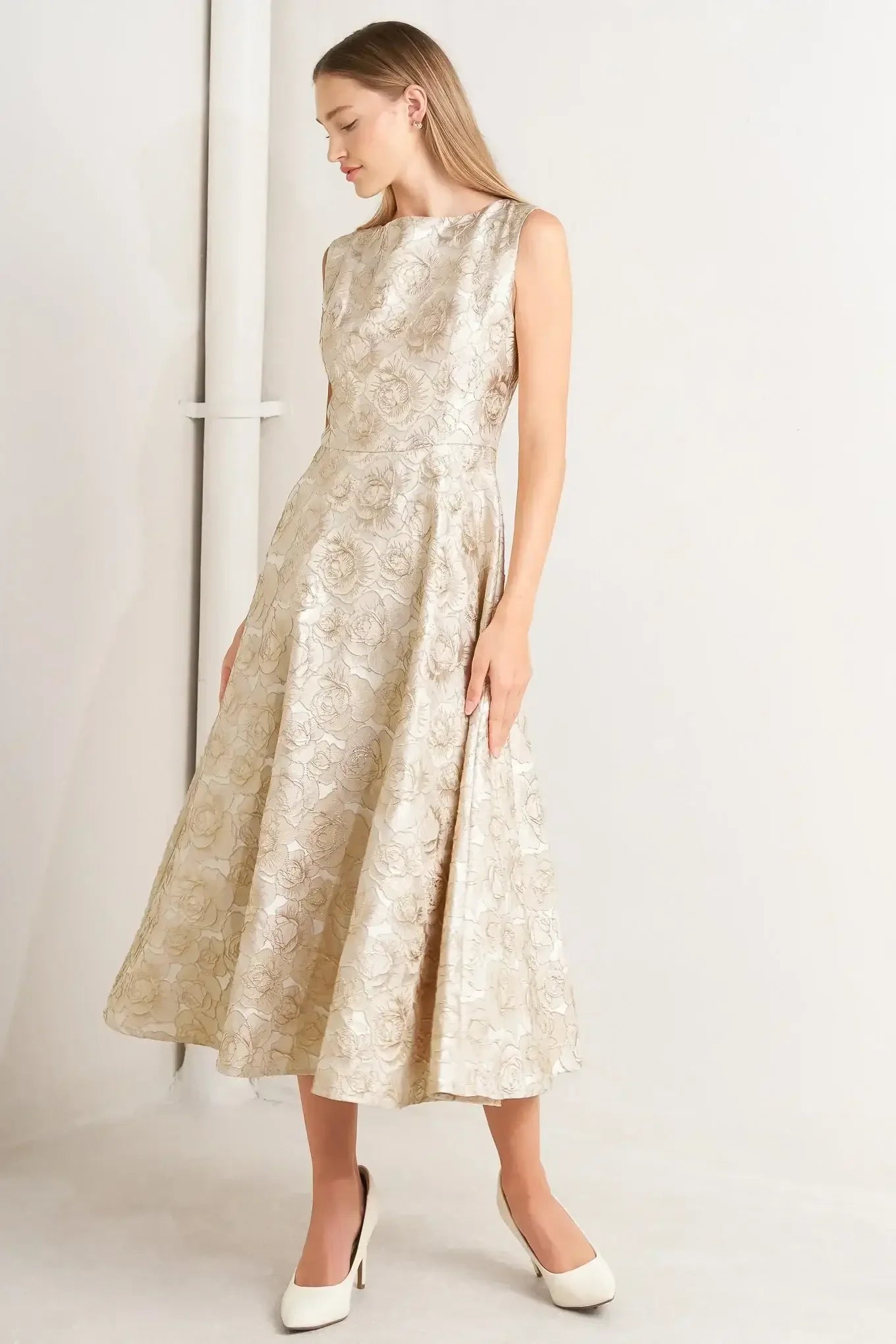 Beige floral dress against