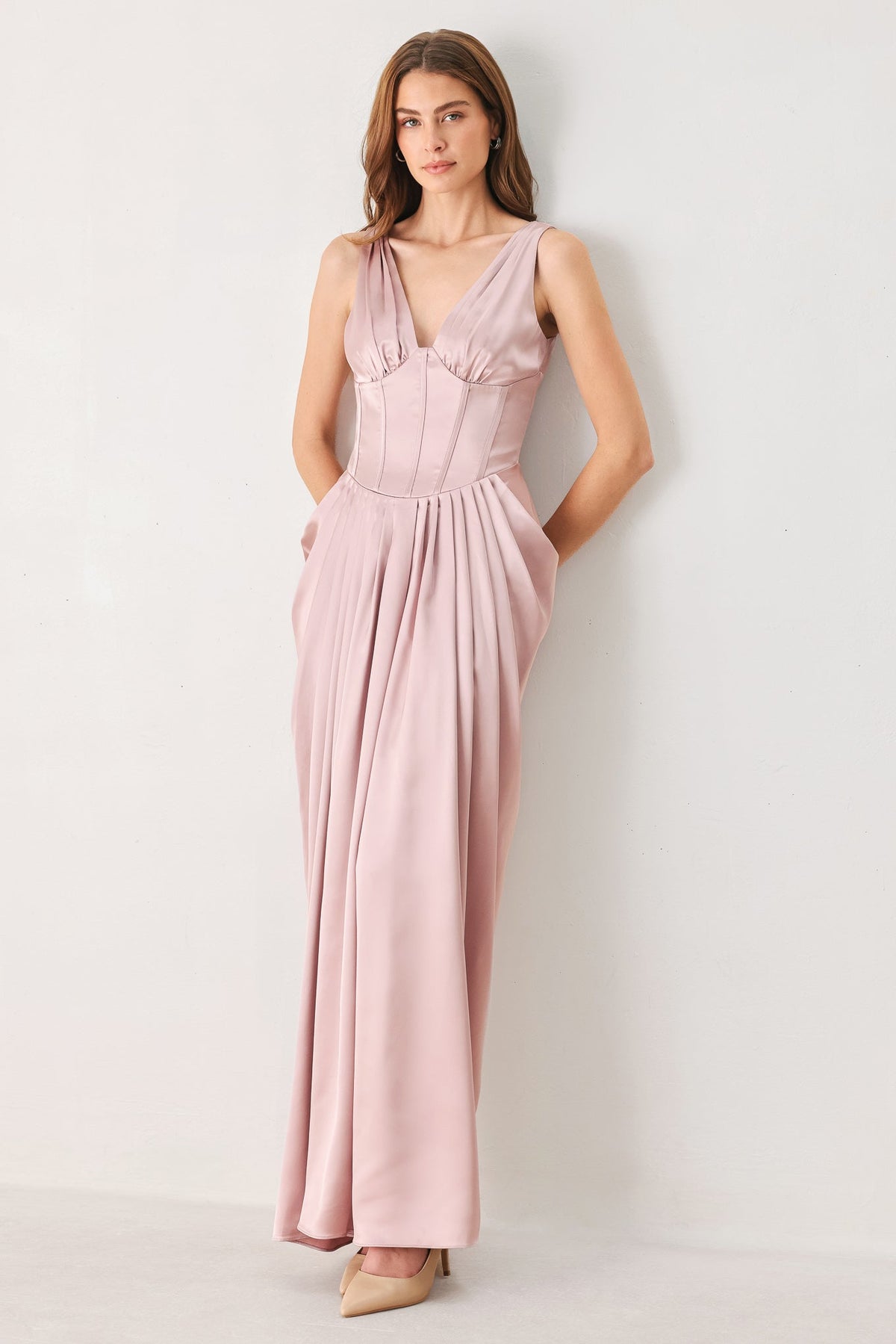 Pink V-Neck Corset Draped Maxi Dress in Pink, front view with hands in pockets | Lady Black Tie