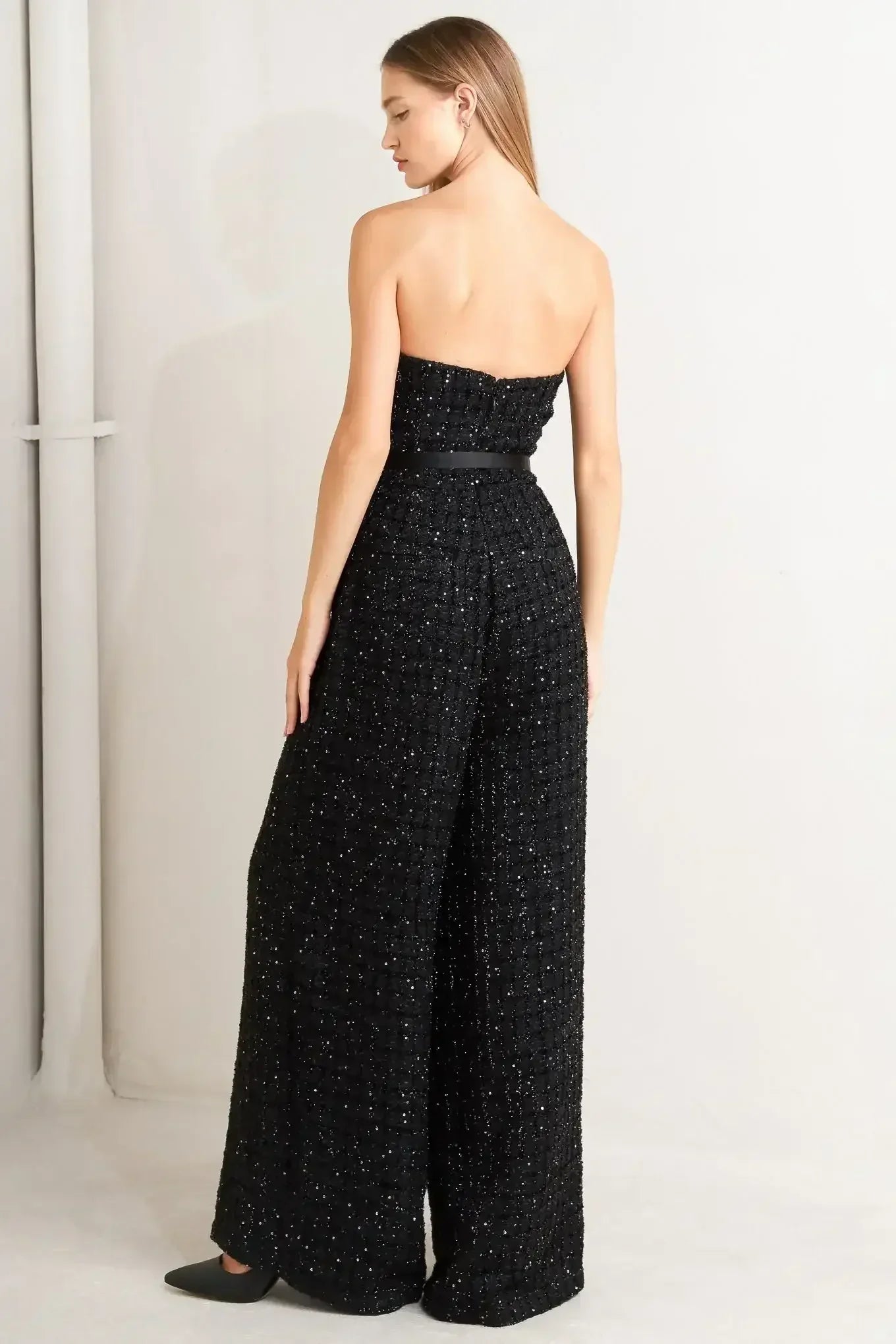 Black strapless jumpsuit with wide-leg pants