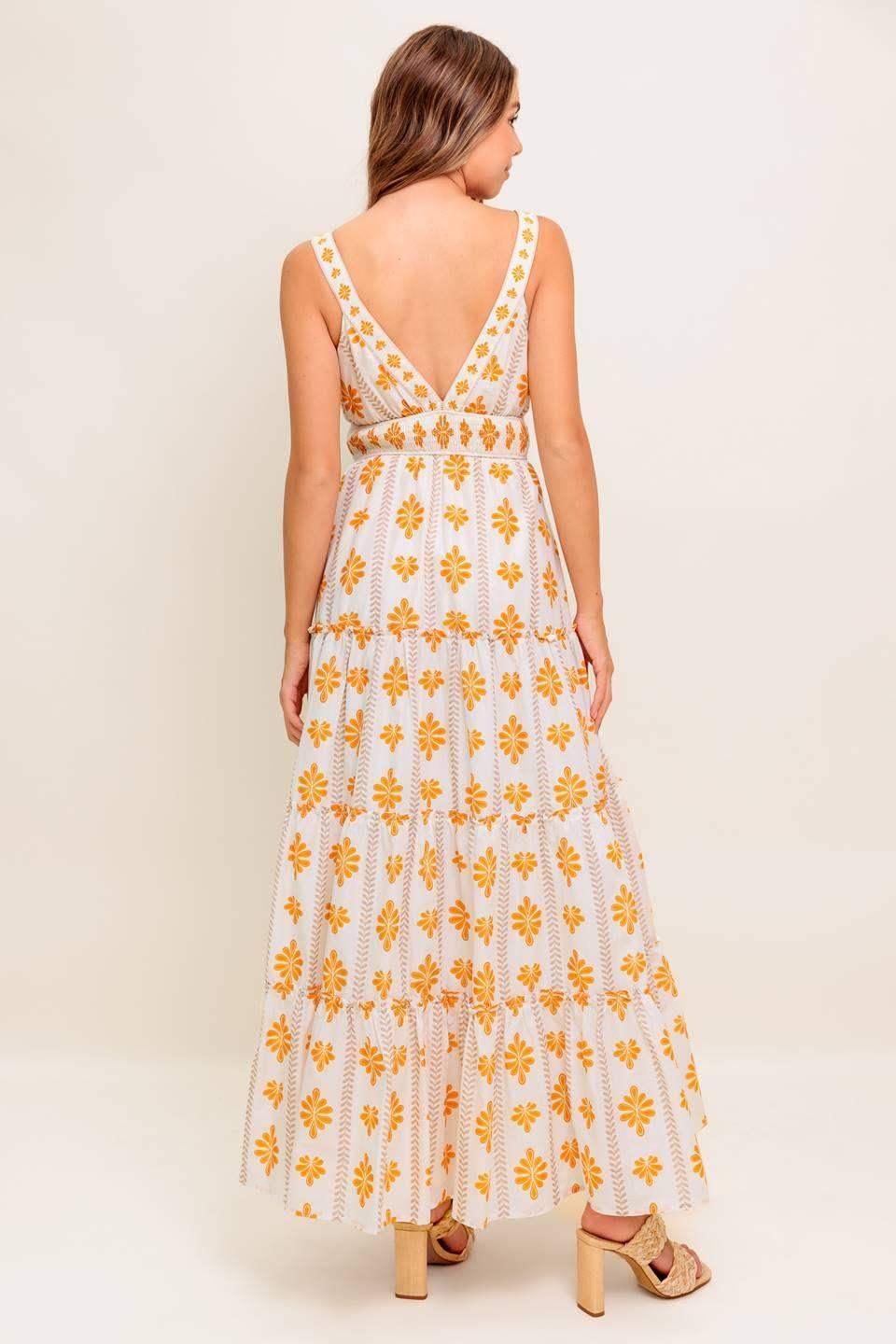White dress with yellow floral patterns