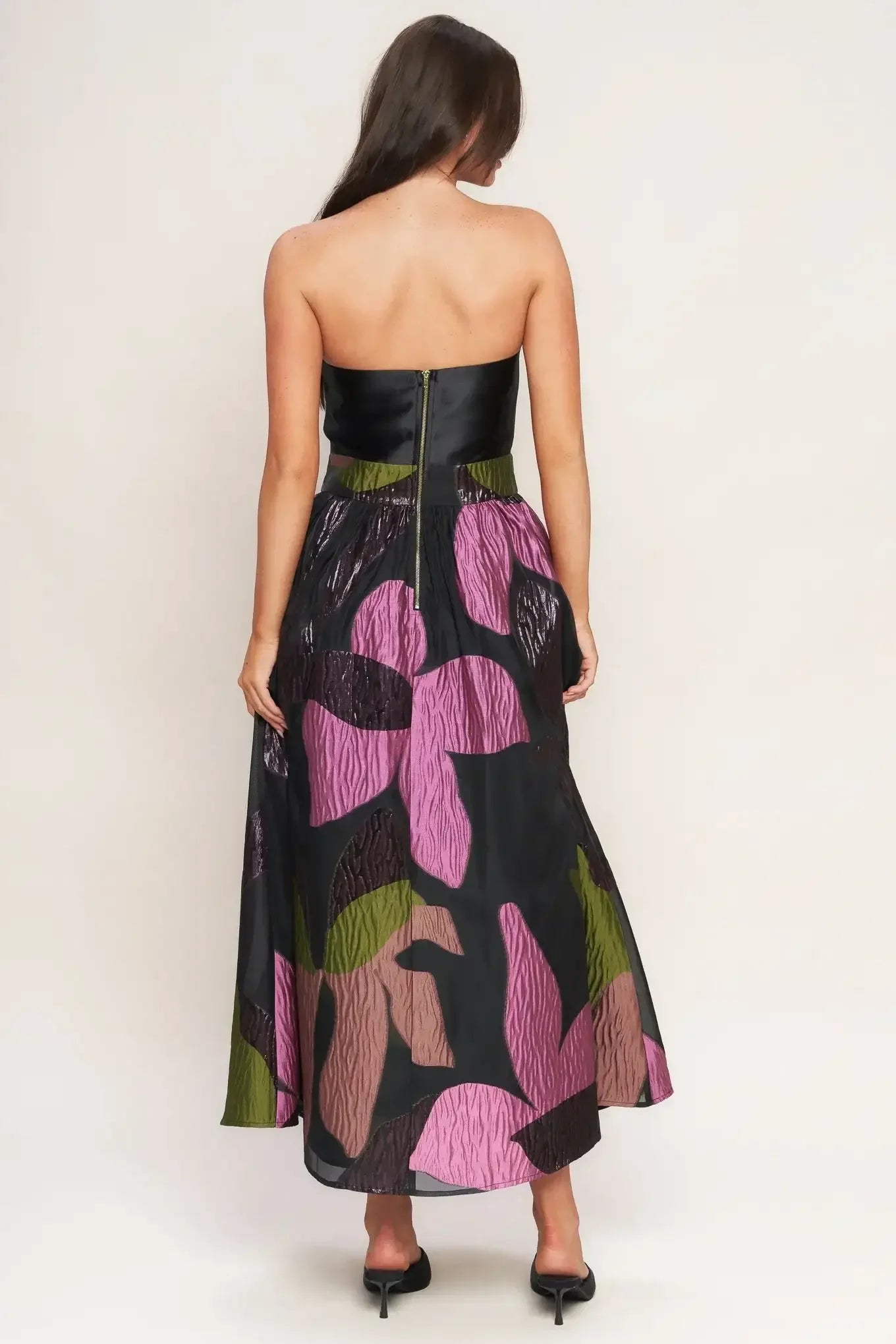 Woman  strapless black dress with floral pattern