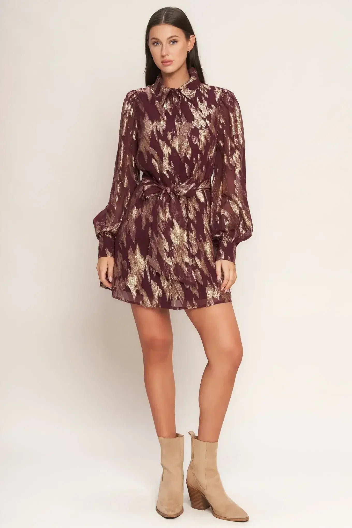 Patterned dress with beige boots