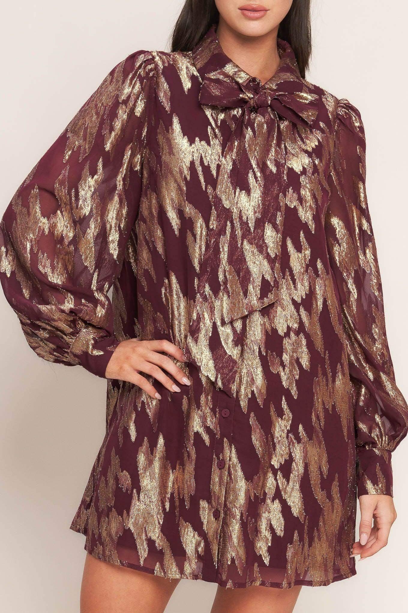 Patterned dress with beige boots