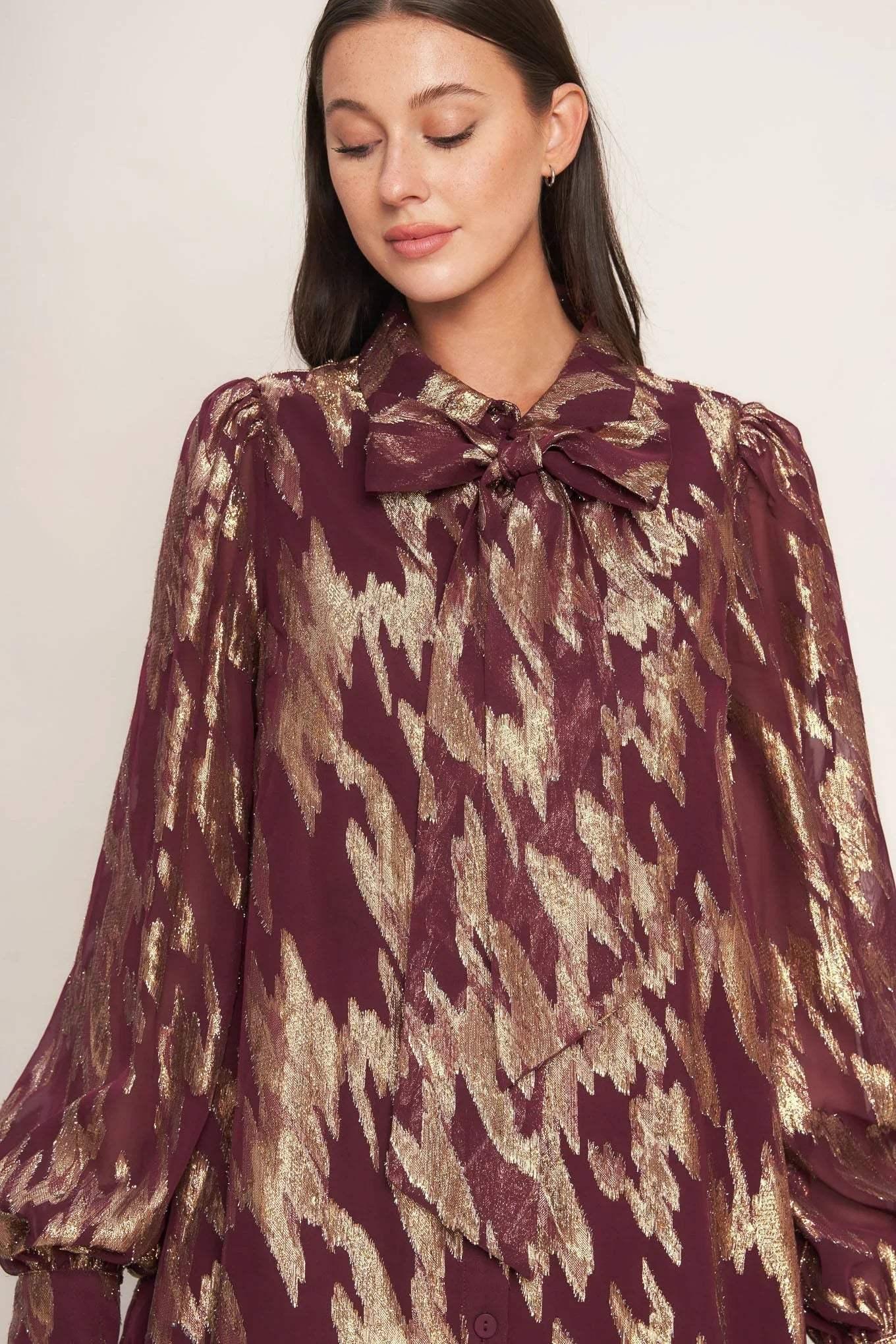 Patterned dress with beige boots