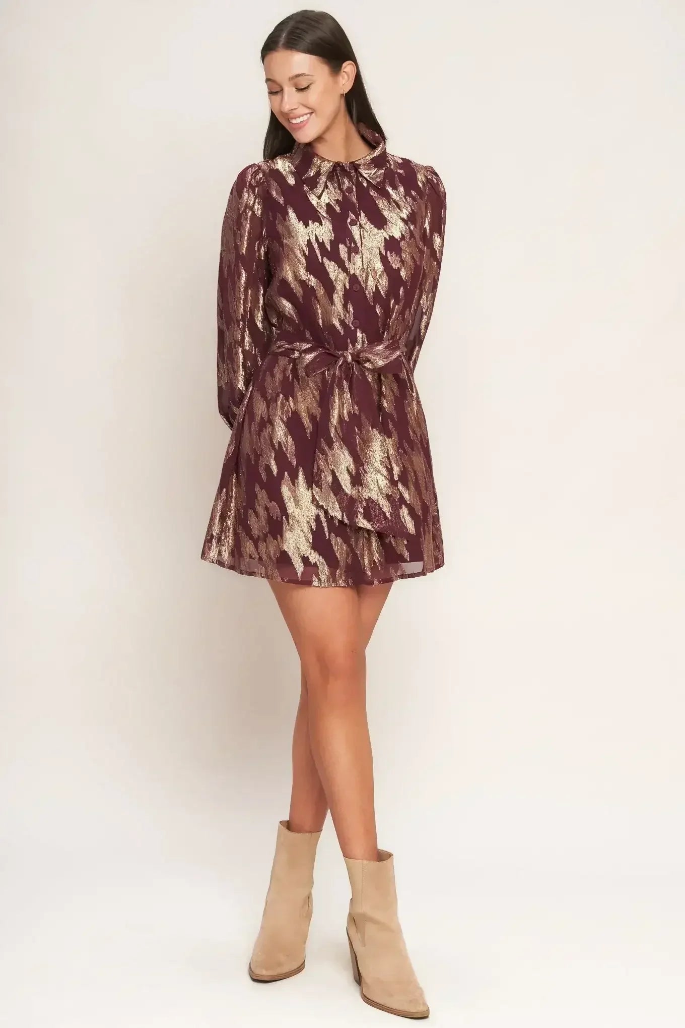 Patterned dress with beige boots
