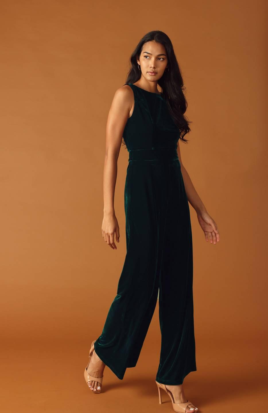 Sleeveless Wide Leg Velvet Jumpsuit in Green, walking view | Lady Black Tie