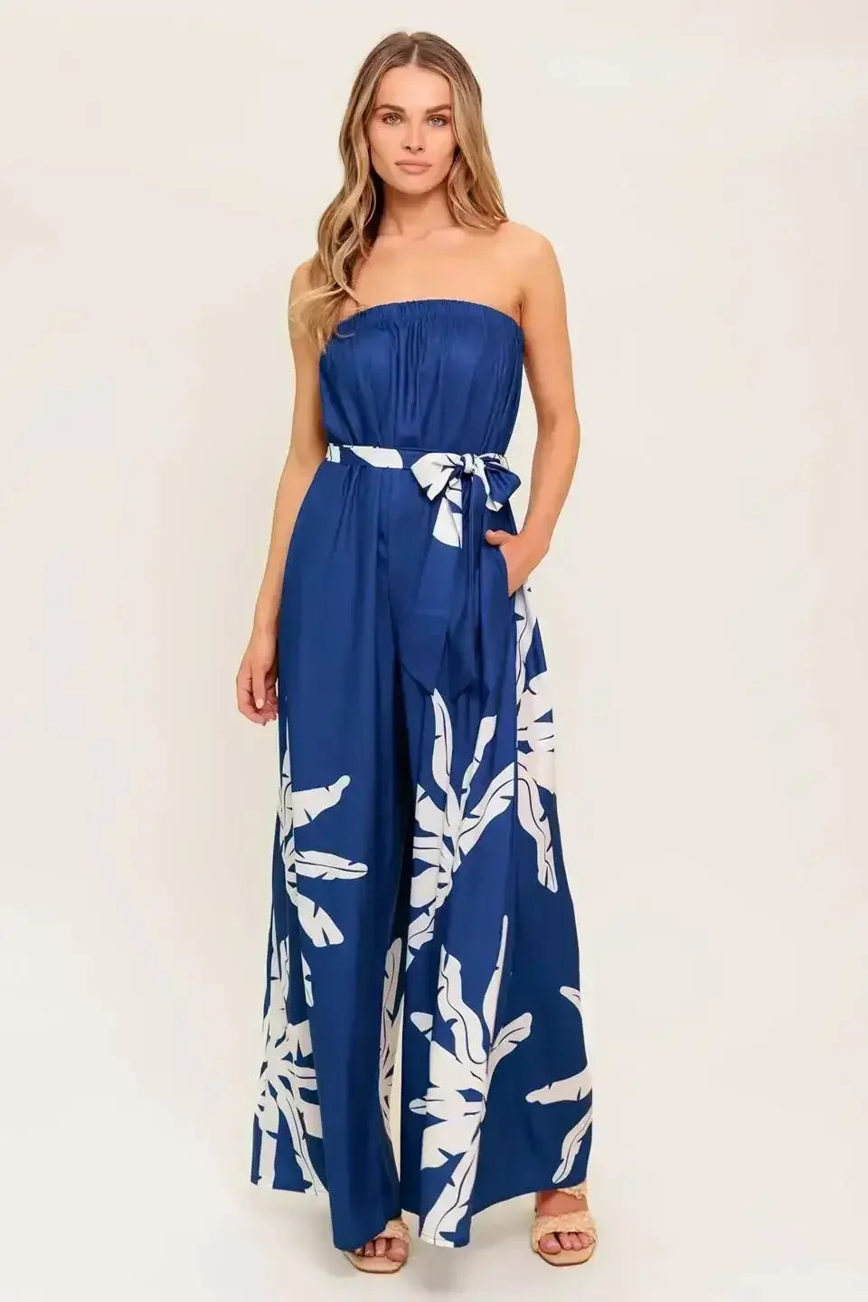 NOLANI STRAPLESS JUMPSUIT | Navy & White Palm Print Wide Leg