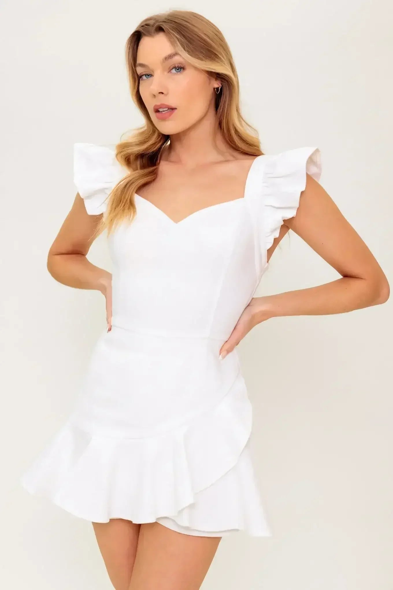 EXPLORING NEW CITIES - WHITE DENIM RUFFLE SKORT ROMPER