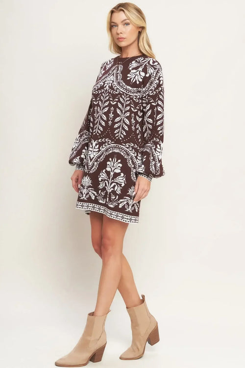 Patterned dress with beige boots