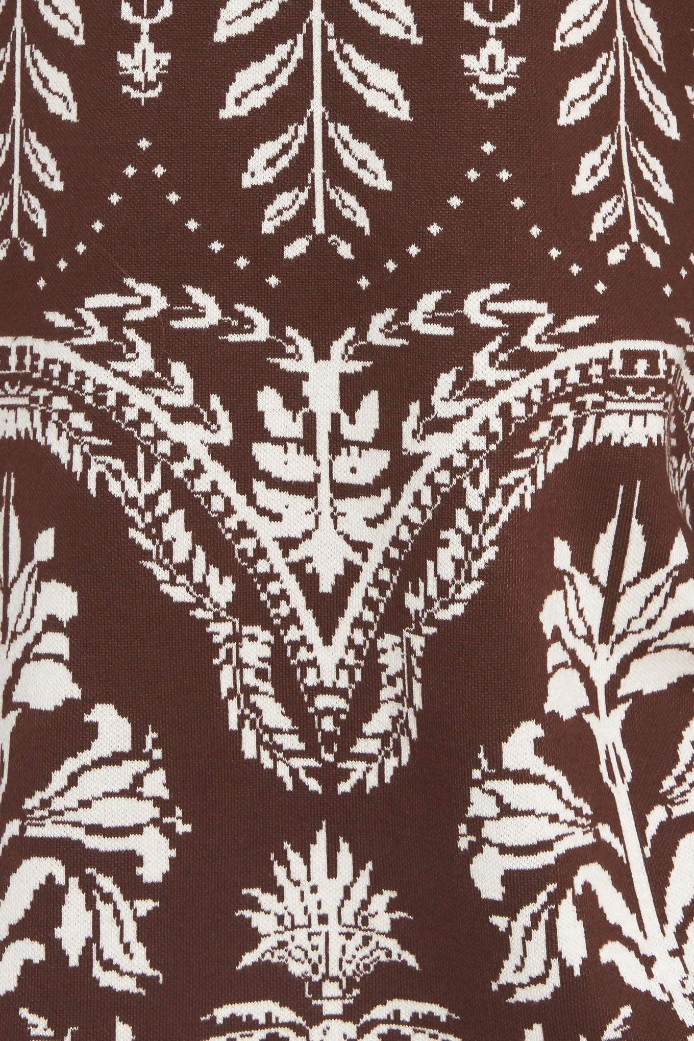 Patterned dress with beige boots