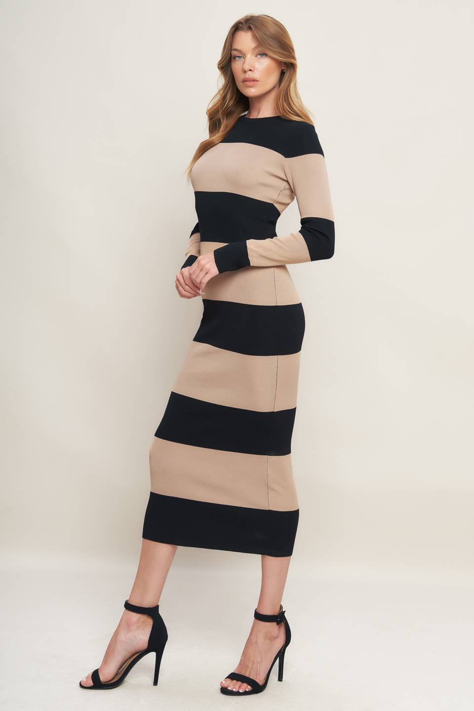 Woman wearing a beige and black striped dress on a white background ESPRESSO & CREAM SWEATER KNIT MIDI DRESS | Lady Black Tie