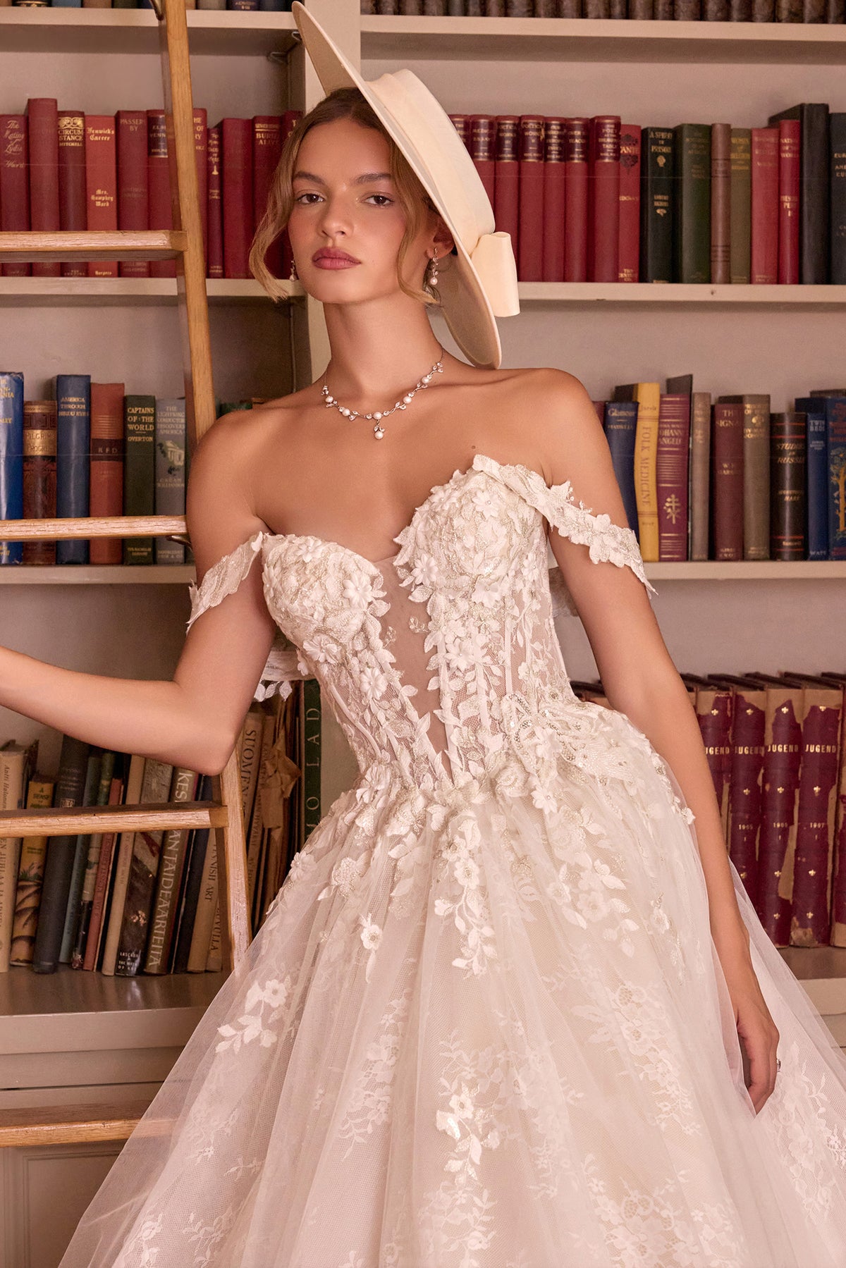 Andrea & Leo WL093 FRENCH WHITE Ball gown Plunging sweetheart neckline with illusion inset, off-the-shoulder floral straps, structured corset bodice, and Concealed zipper back