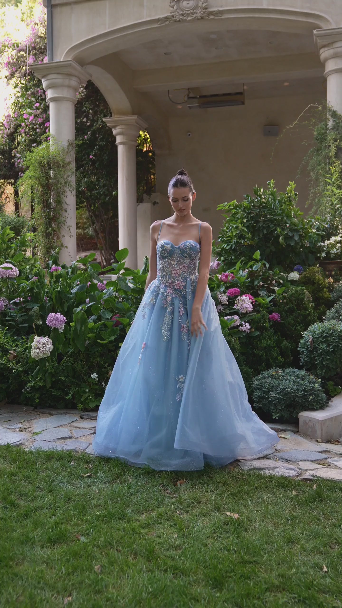 Light blue evening gown with floral embroidery