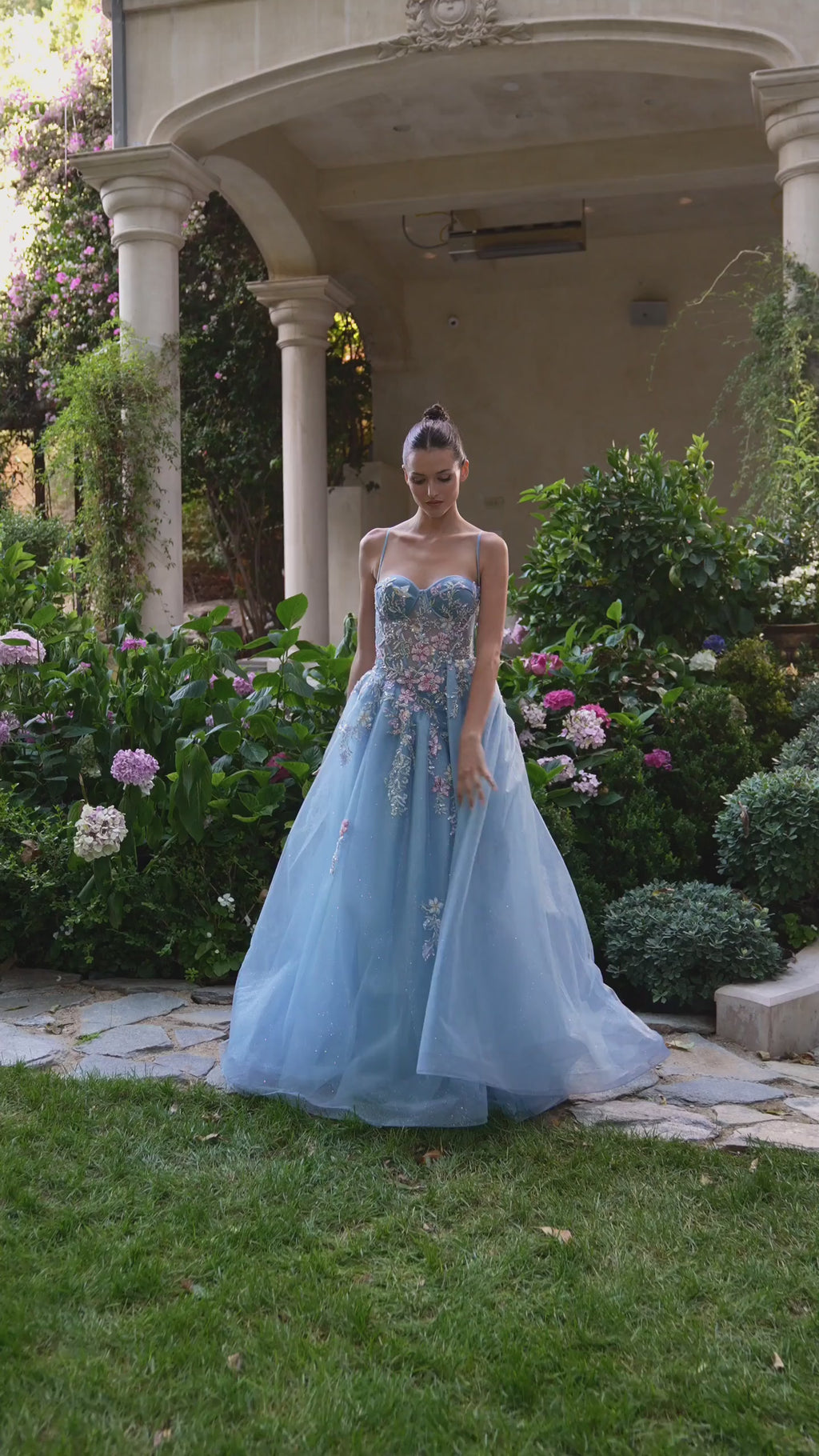 Light blue evening gown with floral embroidery